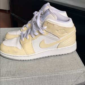 Cream and white Nikes